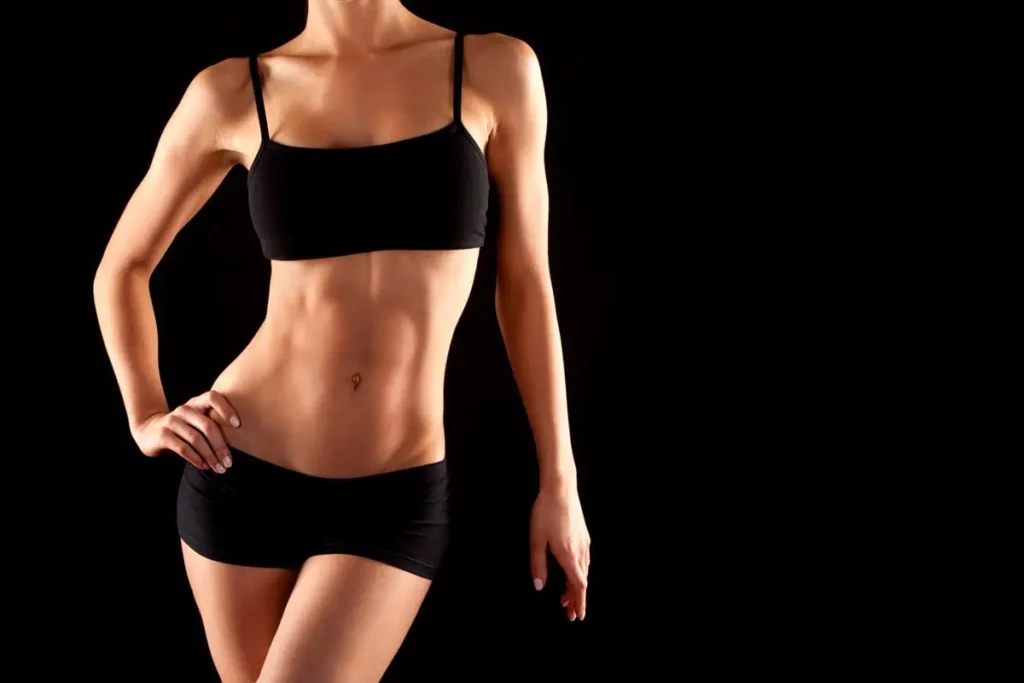 Fit woman shows a toned, sculpted body after body sculpting treatment in Powell, WY.