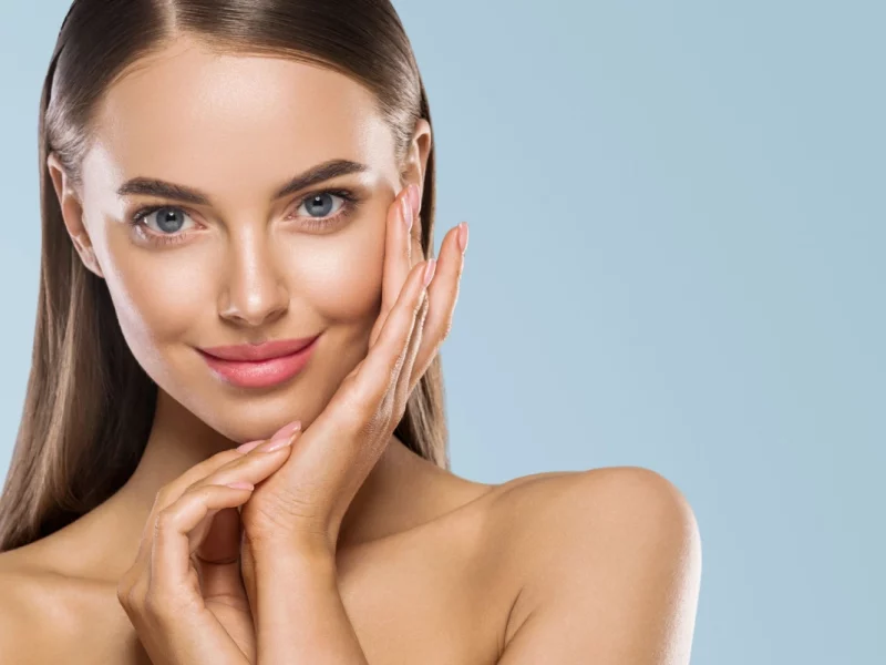 Woman with glowing, smooth skin and soft smile, showing benefits of wellness testing in Powell, WY.